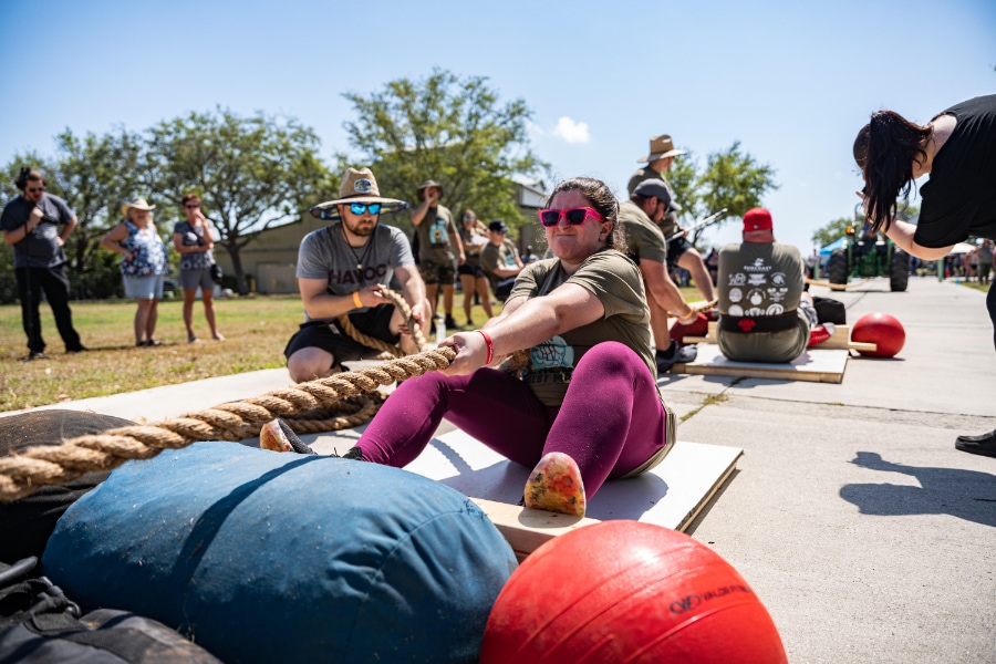 Katya, one of Shannon Palmer's clients pulling a rope during a Strongwoman Competition